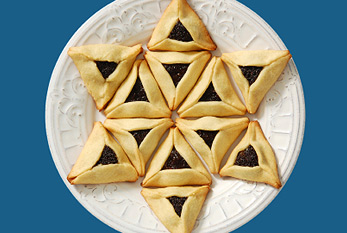 Avec prune rempli Hamantaschen comme une fête pendant le festival de Pourim.